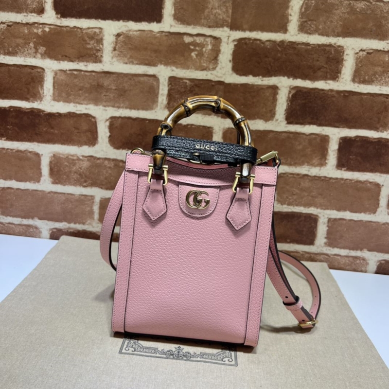 G*u*i top handle bags